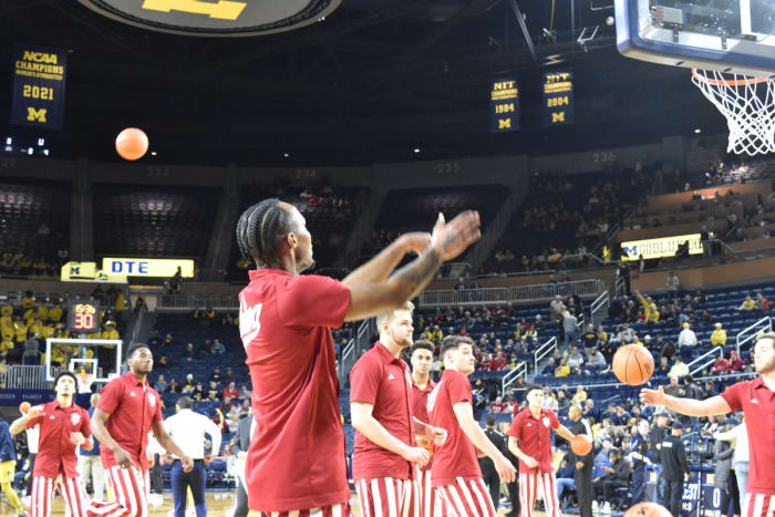 Indiana guard Tamar Bates puts up shots during warmups before Indiana's game against Michigan.